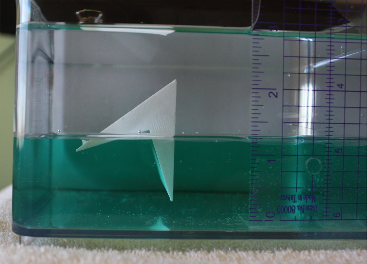 Stability of floating objects at a two-fluid interface - IOPscience
