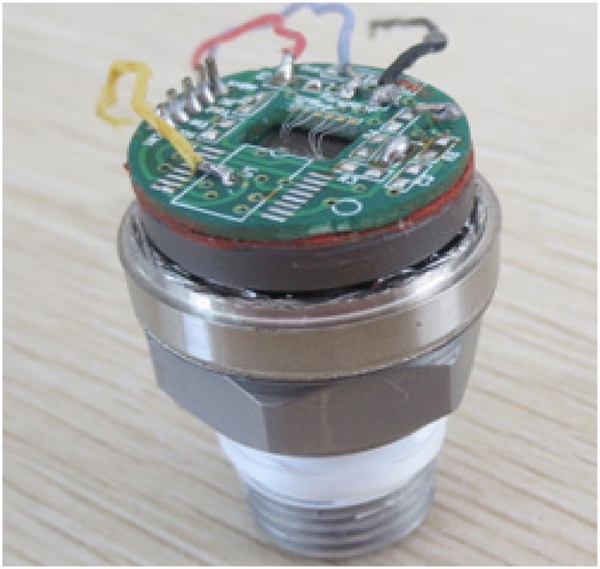 Silicon strain gages bonded on stainless steel using glass frit for ...