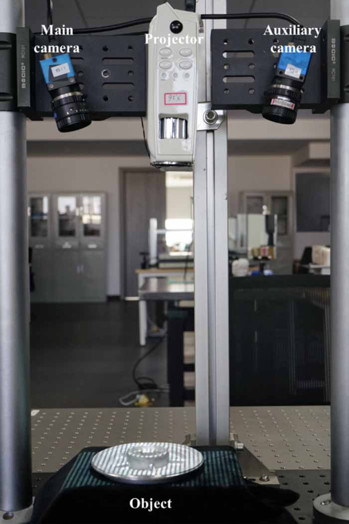 A 3D shape measurement method for high-reflective surface based on dual ...