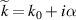 $\widetilde{k} = k_0+{i}\alpha$